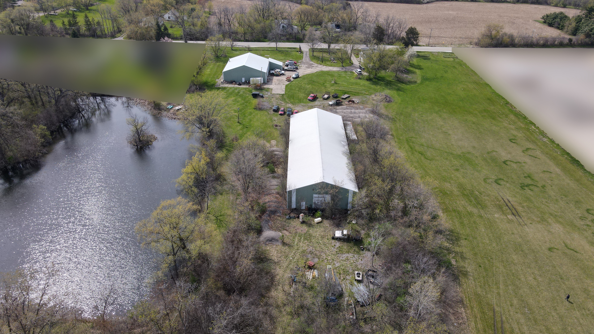37835 North Dilleys Road Wadsworth, IL 60083 - Photo 4 of 7 a aerial view of a house with a yard and lake view