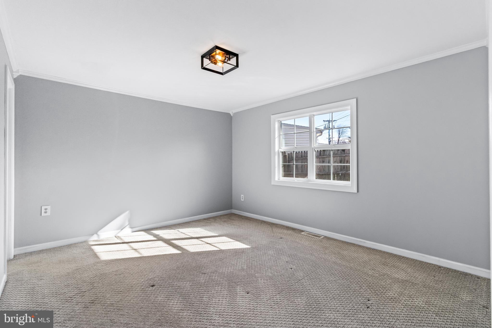 1000 8th Street Laurel, MD 20707 - Photo 15 of 45 an empty room with a window