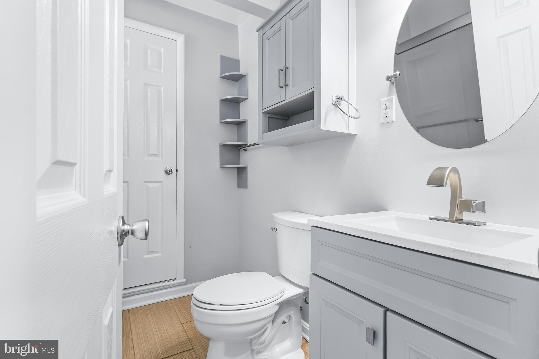 1000 8th Street Laurel, MD 20707 - Photo 20 of 45 a bathroom with a sink toilet and shower