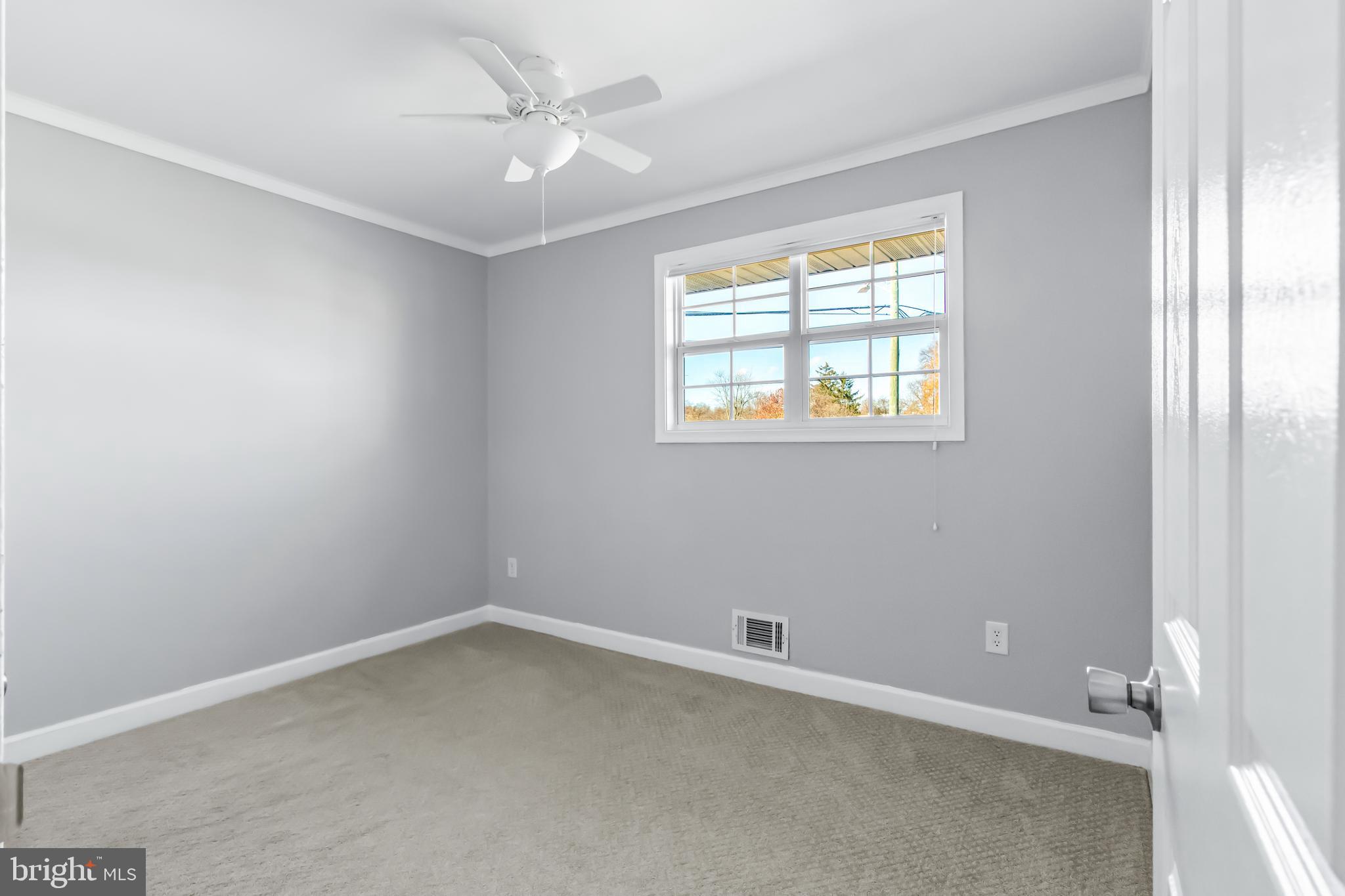1000 8th Street Laurel, MD 20707 - Photo 31 of 45 an empty room with a window