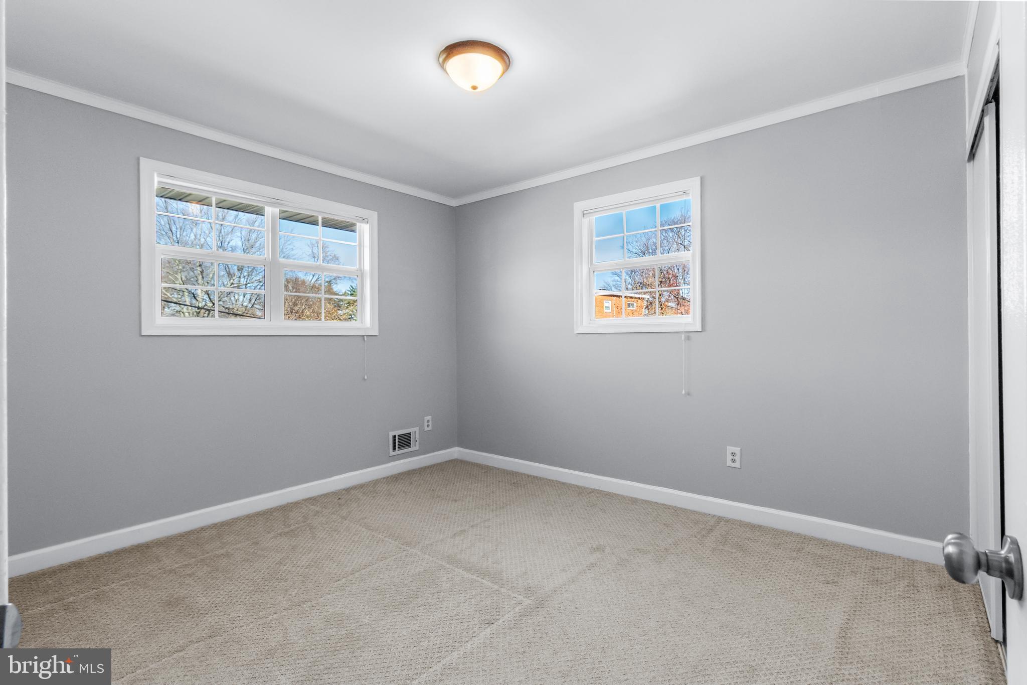1000 8th Street Laurel, MD 20707 - Photo 36 of 45 an empty room with a window