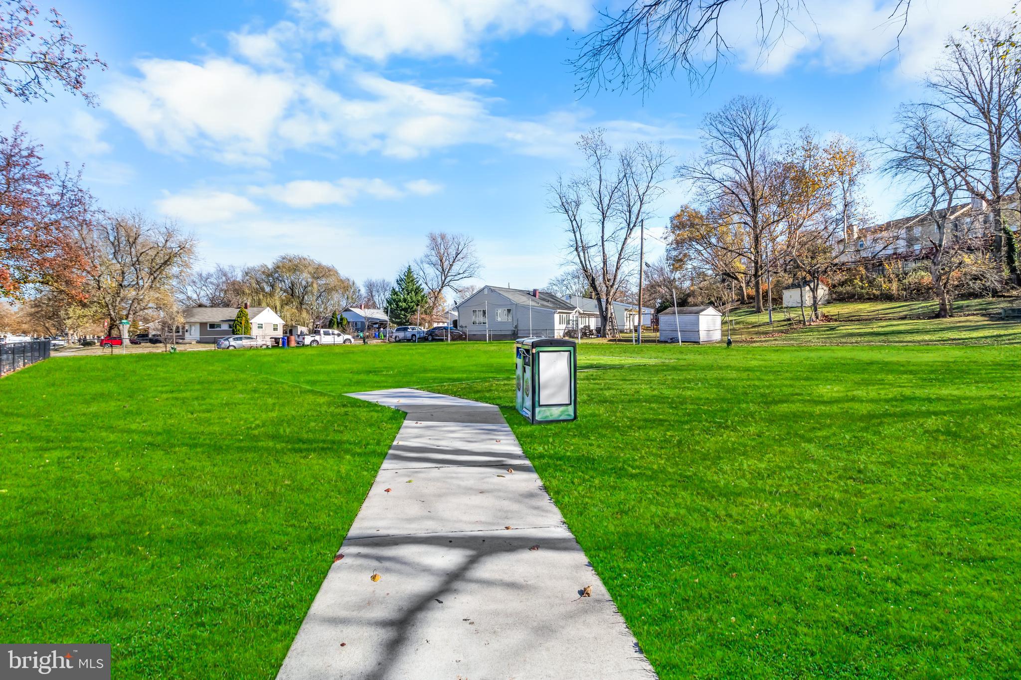 1000 8th Street Laurel, MD 20707 - Photo 37 of 45 a front view of a garden with fountain