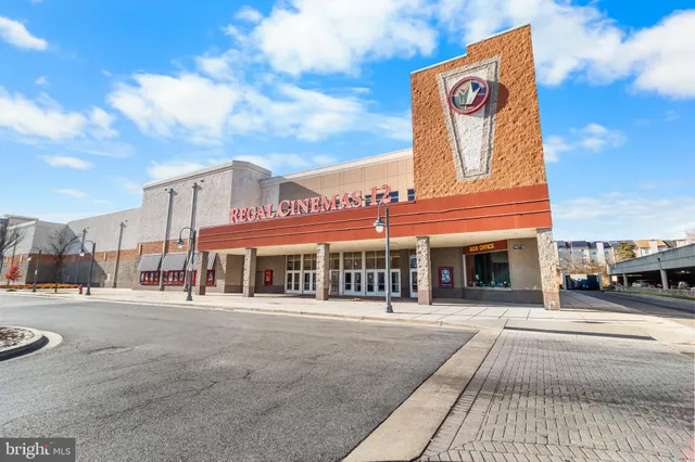 a front view of house with outdoor space and garden