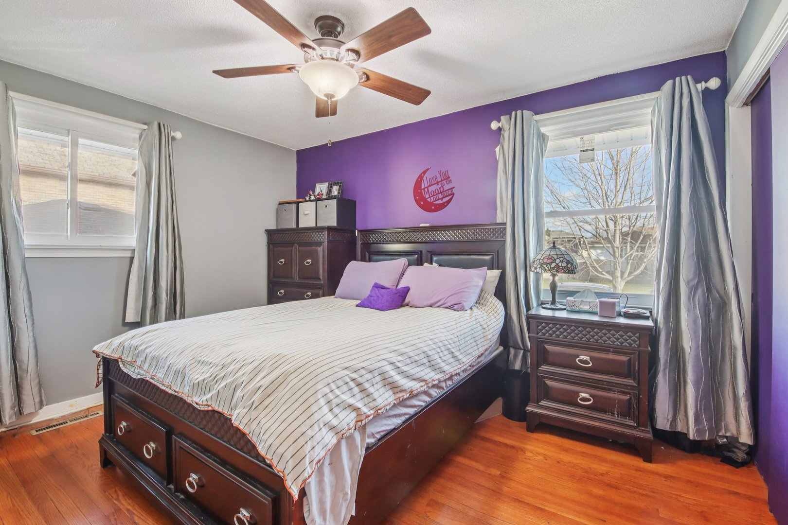 4604 Maple Avenue Forest View, IL 60402 - Photo 14 of 35 a bedroom with a bed dresser and a window