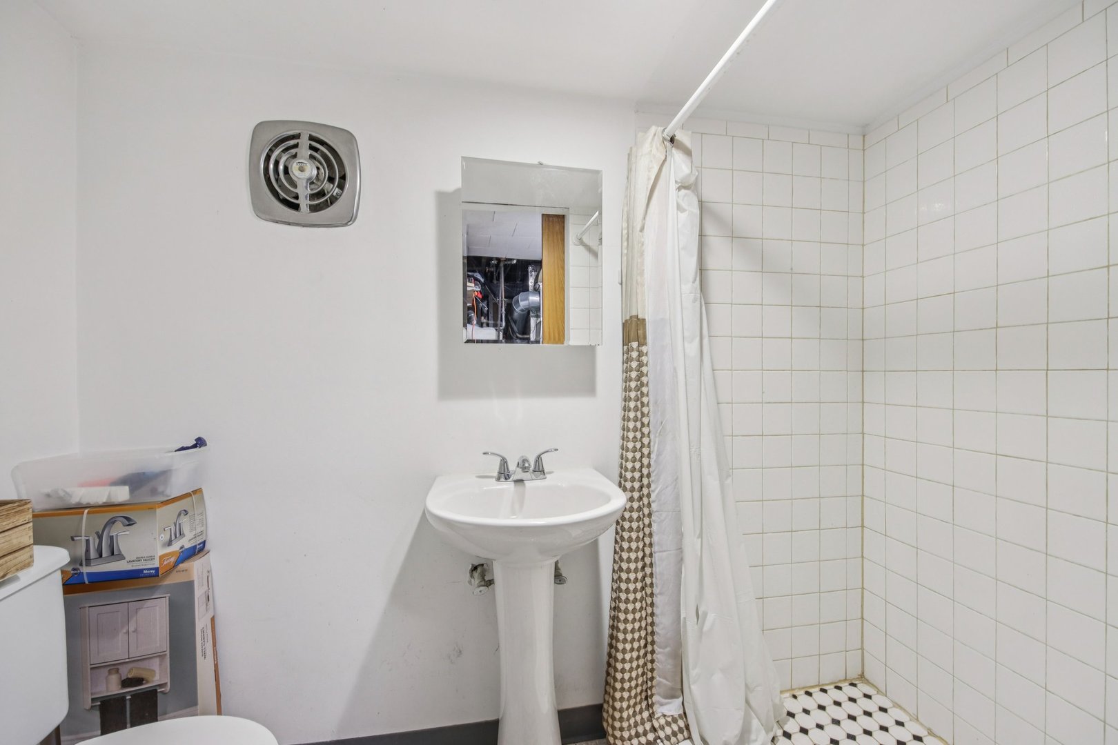 4604 Maple Avenue Forest View, IL 60402 - Photo 17 of 35 a bathroom with a sink a toilet a shower and a mirror