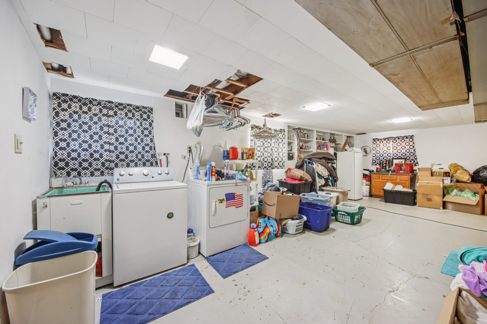4604 Maple Avenue Forest View, IL 60402 - Photo 19 of 35 a storage room with lots of clutter and white cabinets