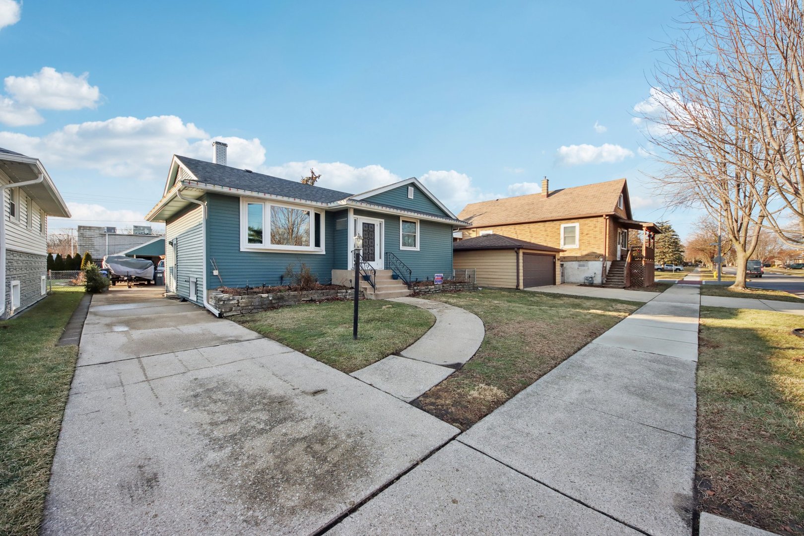 4604 Maple Avenue Forest View, IL 60402 - Photo 30 of 35 a front view of a house with a yard and trees