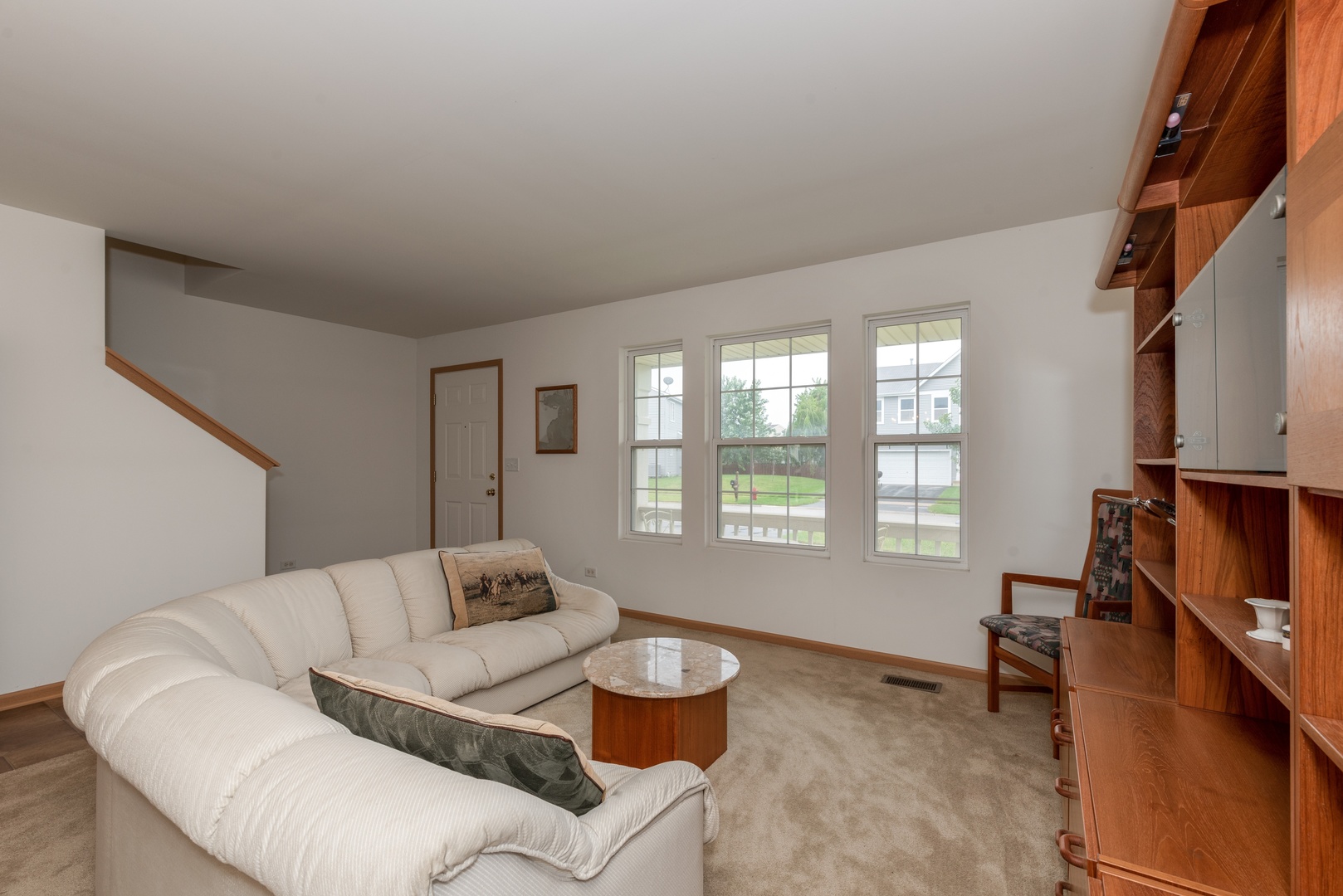 1143 Port Royal Road Pingree Grove, IL 60140 - Photo 2 of 13 a living room with furniture and a window