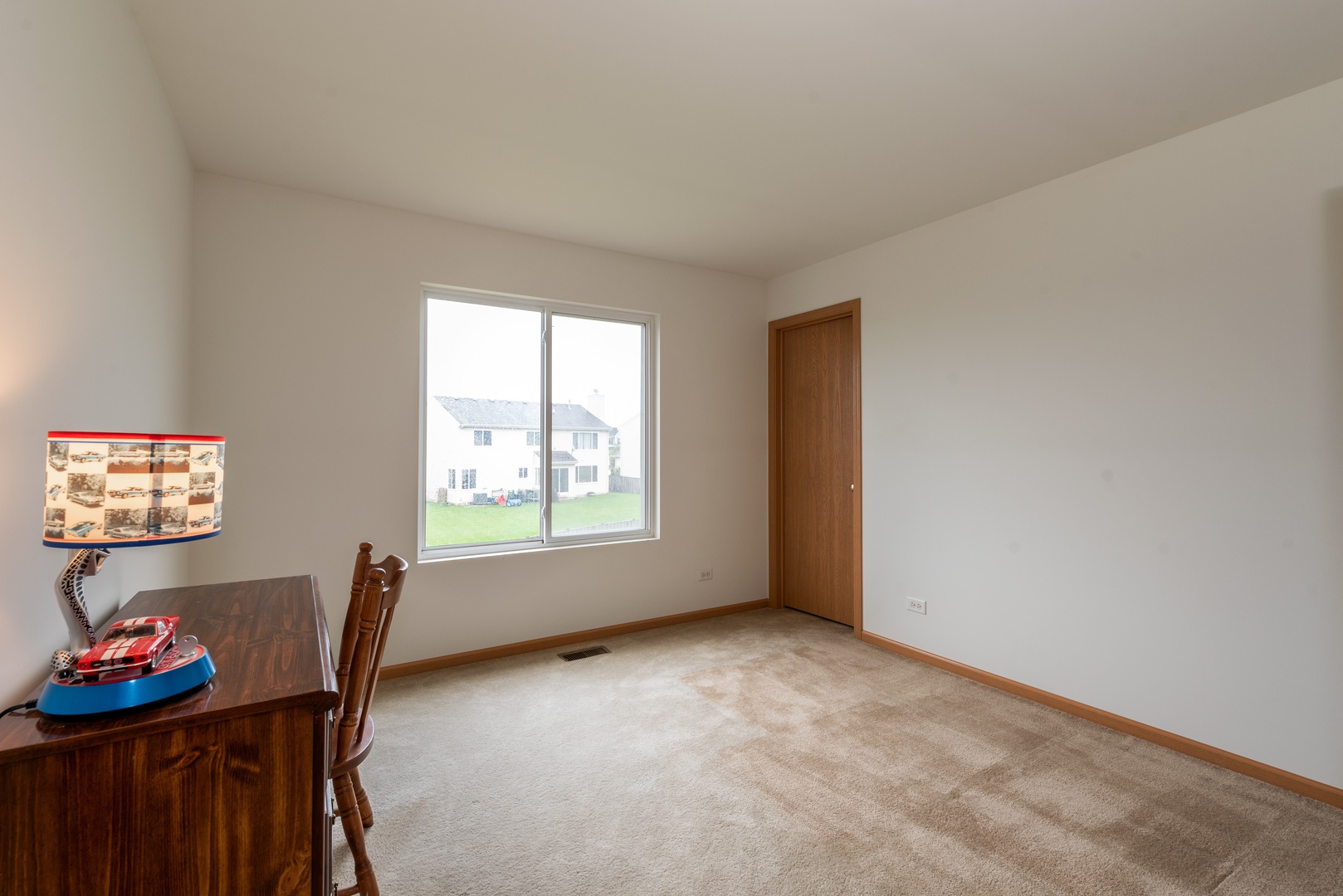 1143 Port Royal Road Pingree Grove, IL 60140 - Photo 10 of 13 a view of livingroom with furniture and window