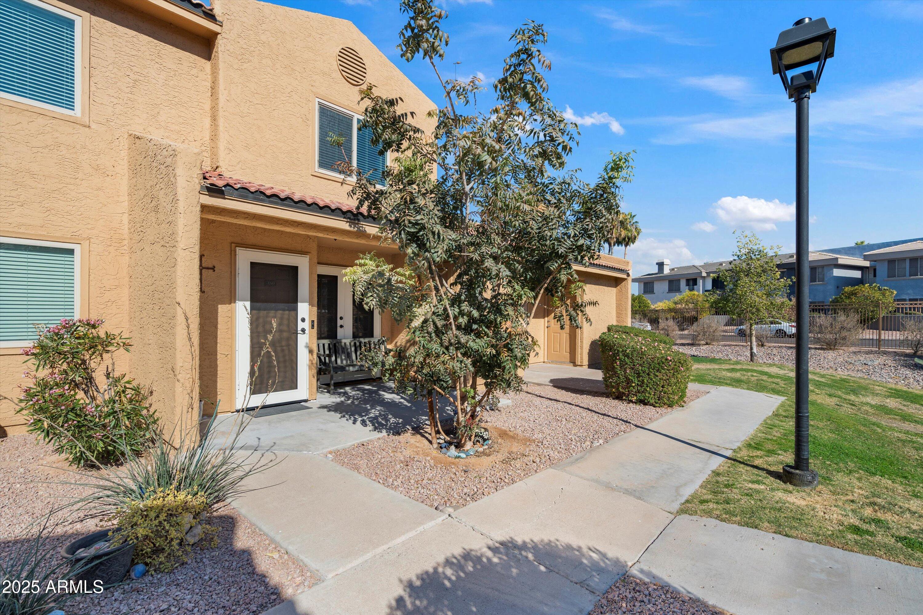 3511 East Baseline Road, Unit 1243 Phoenix, AZ 85042 - Photo 2 of 31 03-Front of Condo