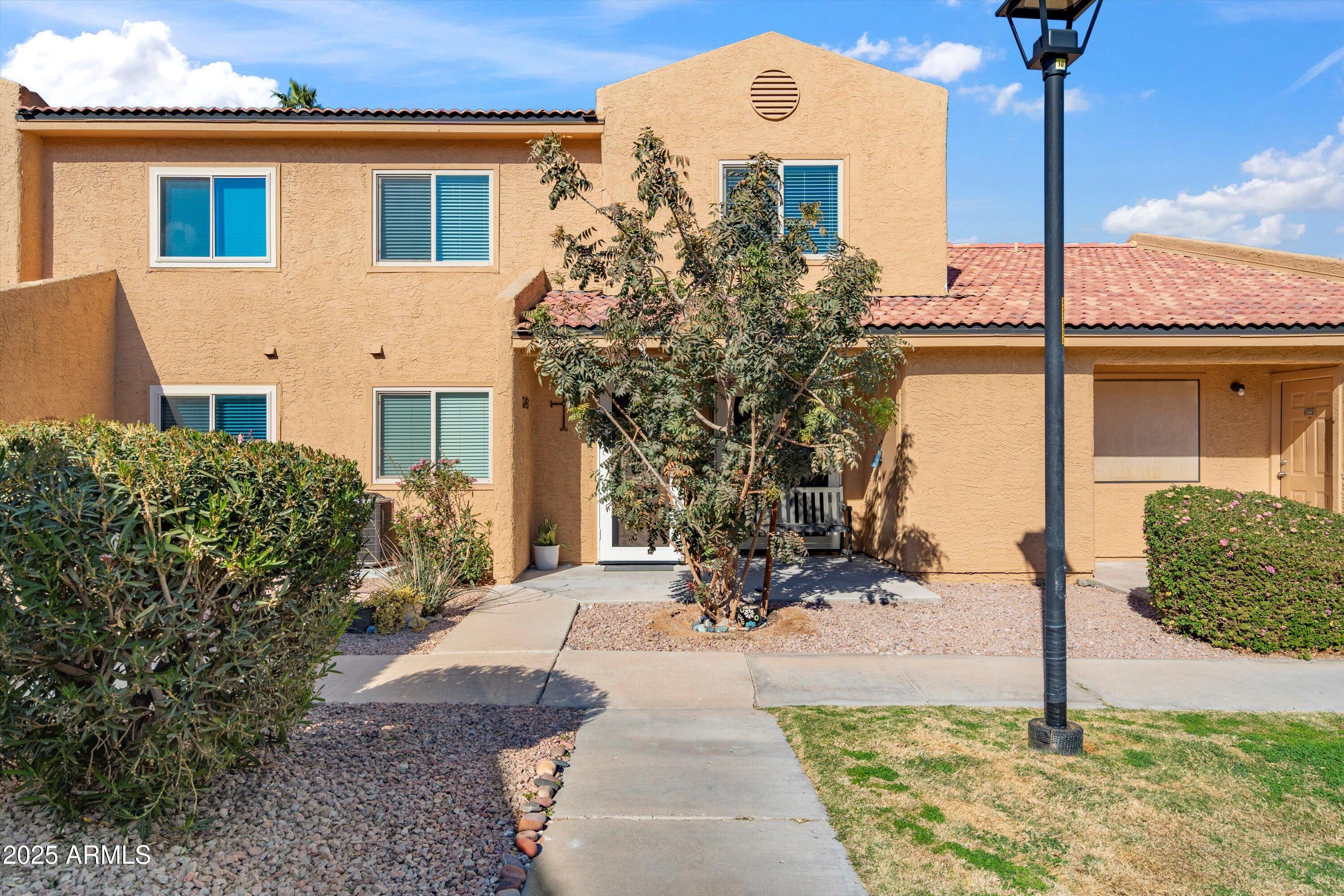 3511 East Baseline Road, Unit 1243 Phoenix, AZ 85042 - Photo 3 of 31 04-Front of Condo