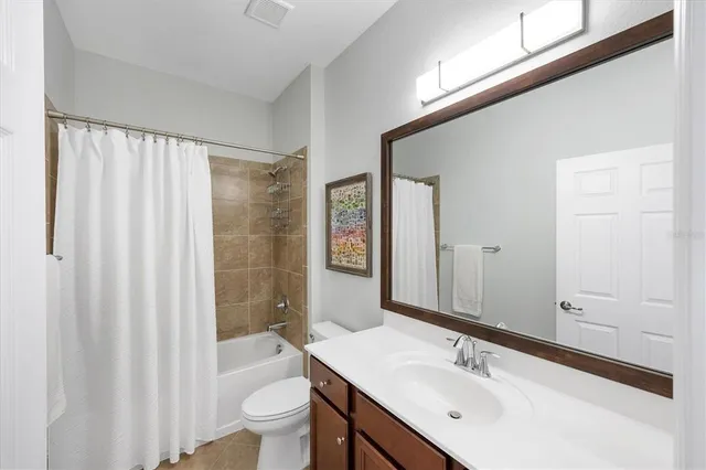 an aerial view of a house with a outdoor space