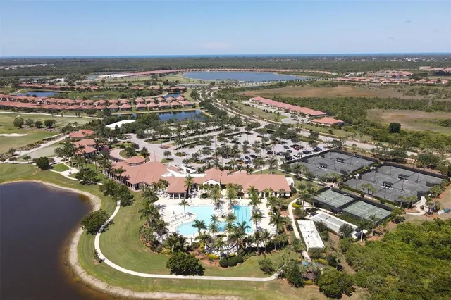a view of a golf course with a lake
