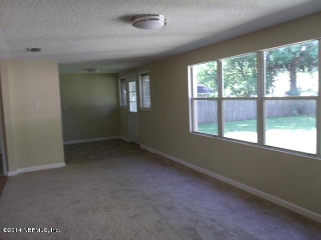 2516 Bayview Road Jacksonville, FL 32210 - Photo 2 of 8 an empty room with a window