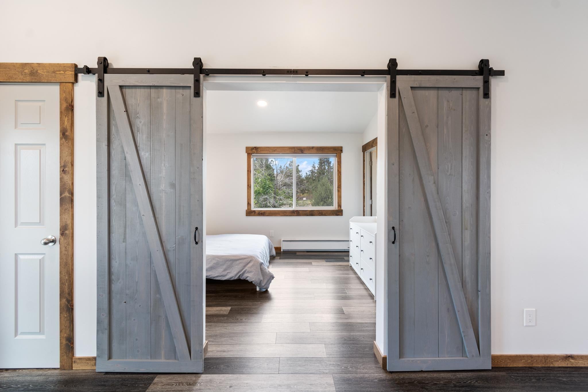 63262 Vogt Road Bend, OR 97701 - Photo 53 of 65 ADDITION: Barn doors for primary bedroom