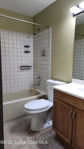 a view of a room with a window