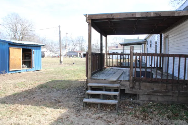 a house with trees in front of it