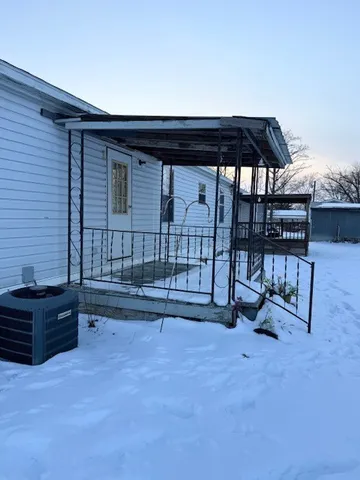 a view of swimming pool with outdoor seating