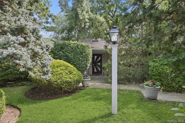 a view of a backyard with garden