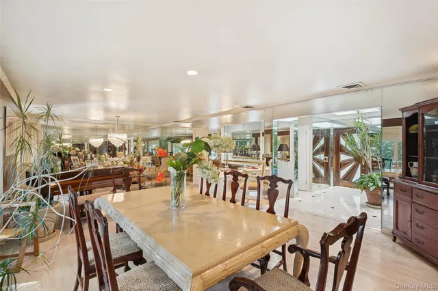 a dining room with lots of table and chairs
