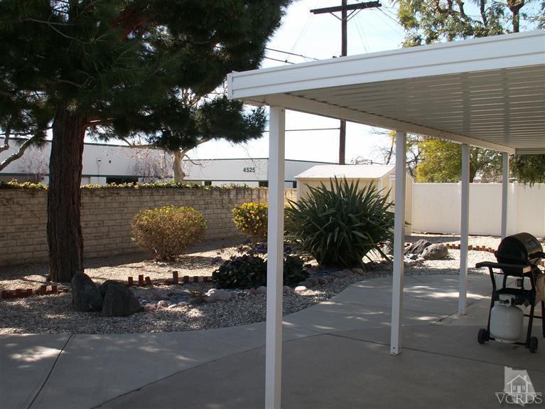 4512 Alpine Street Simi Valley, CA 93063 - Photo 3 of 11 a view of a lake with sitting area