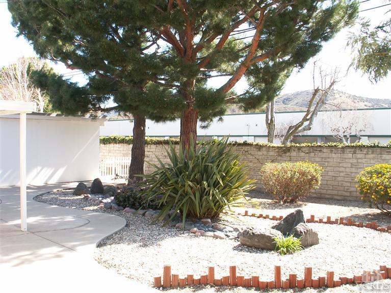 4512 Alpine Street Simi Valley, CA 93063 - Photo 6 of 11 a view of a yard with trees