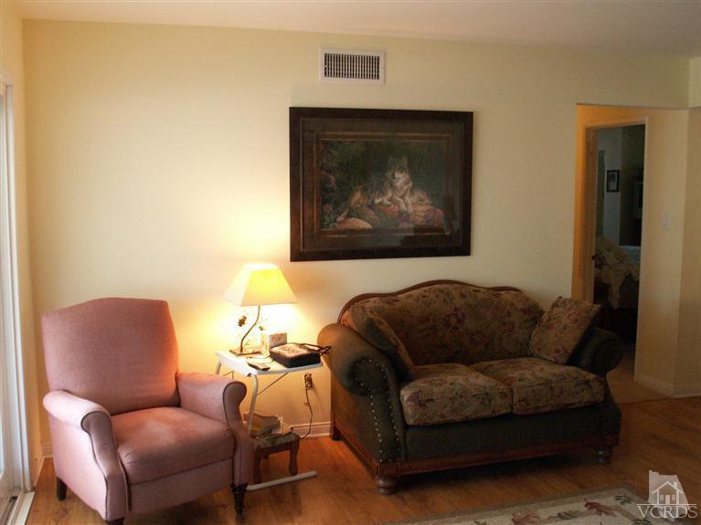 4512 Alpine Street Simi Valley, CA 93063 - Photo 7 of 11 a living room with furniture and a couch
