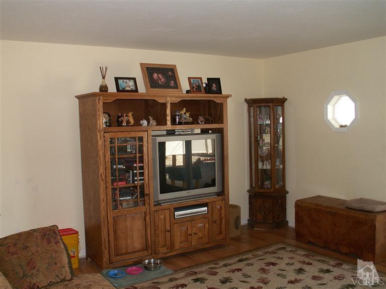 4512 Alpine Street Simi Valley, CA 93063 - Photo 10 of 11 a living room with furniture and a window