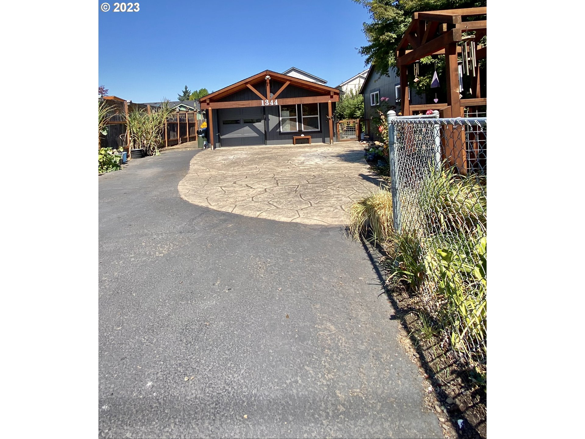1344 S Street Springfield, OR 97477 - Photo 11 of 30 a view of a house with a small yard