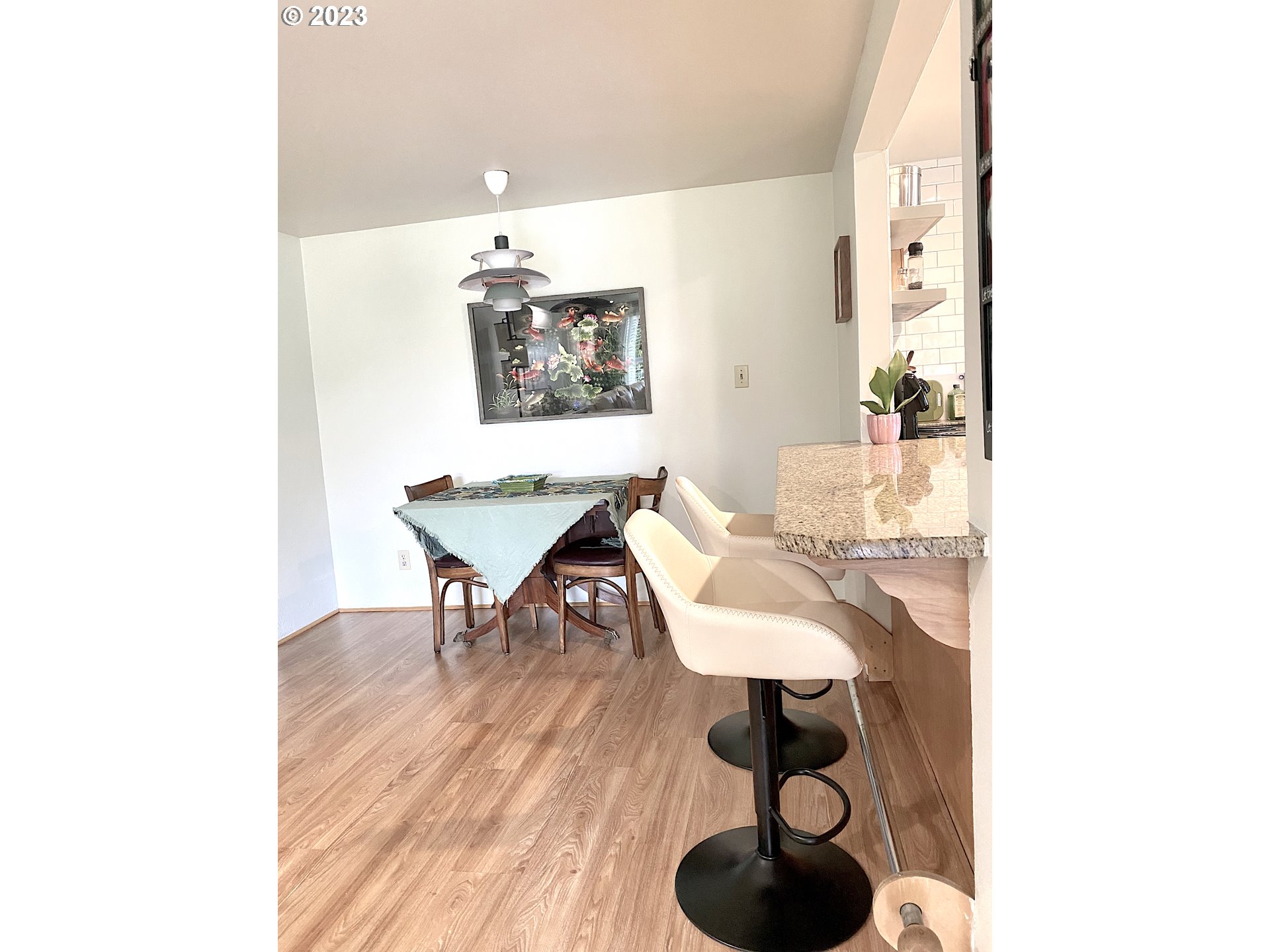 1344 S Street Springfield, OR 97477 - Photo 16 of 30 a living room with furniture and a wooden floor