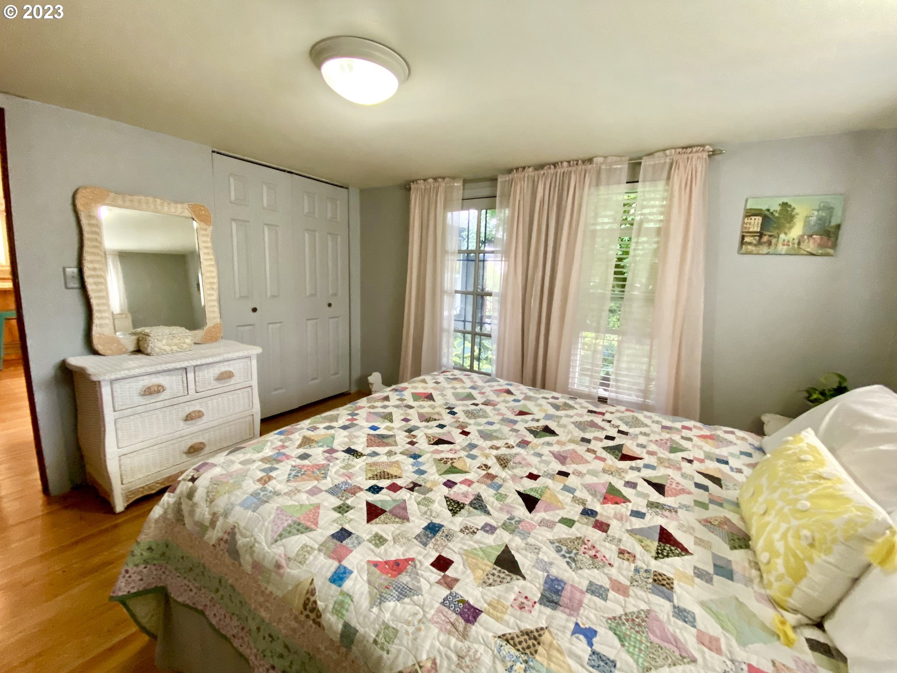 1344 S Street Springfield, OR 97477 - Photo 24 of 30 a bedroom with a bed and a dresser