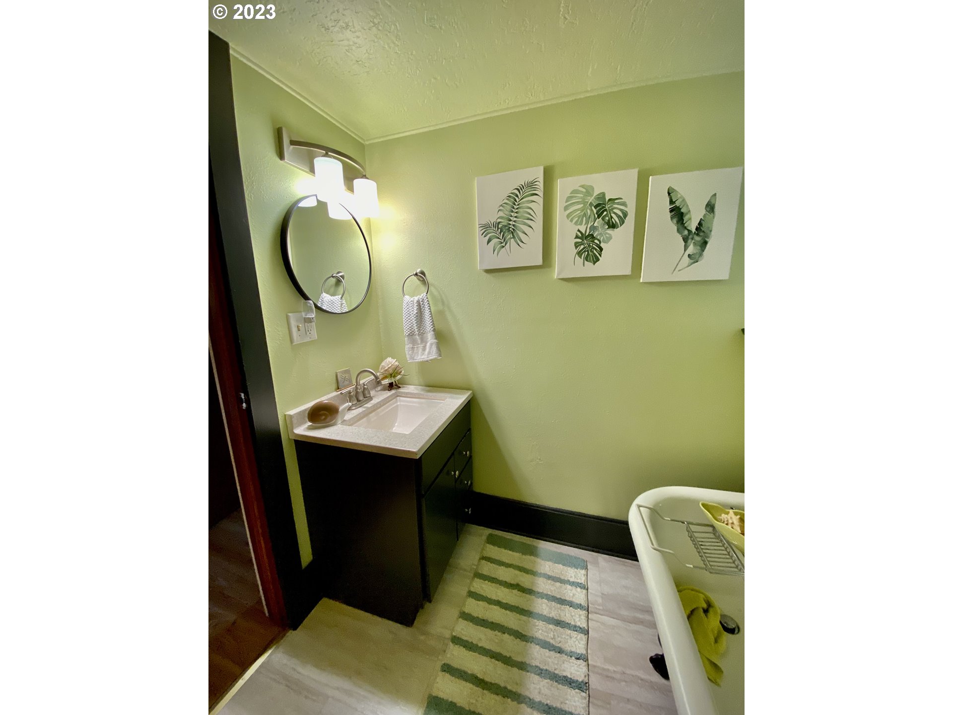 1344 S Street Springfield, OR 97477 - Photo 26 of 30 a bathroom with a sink mirror and toilet