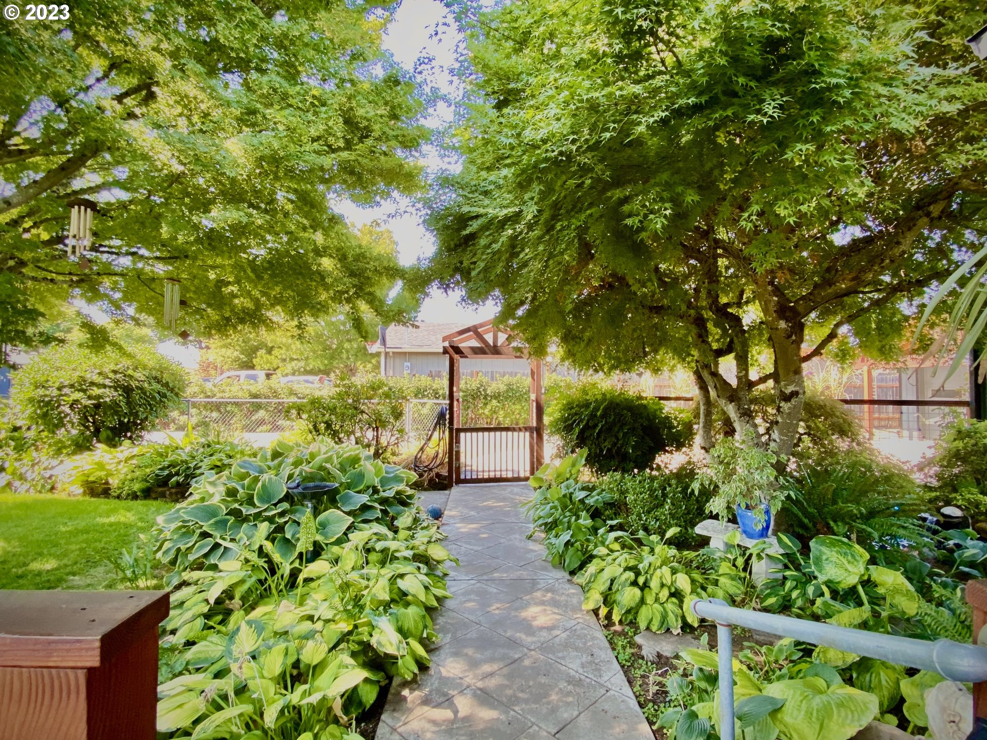 1344 S Street Springfield, OR 97477 - Photo 8 of 30 a view of a pathway in a garden