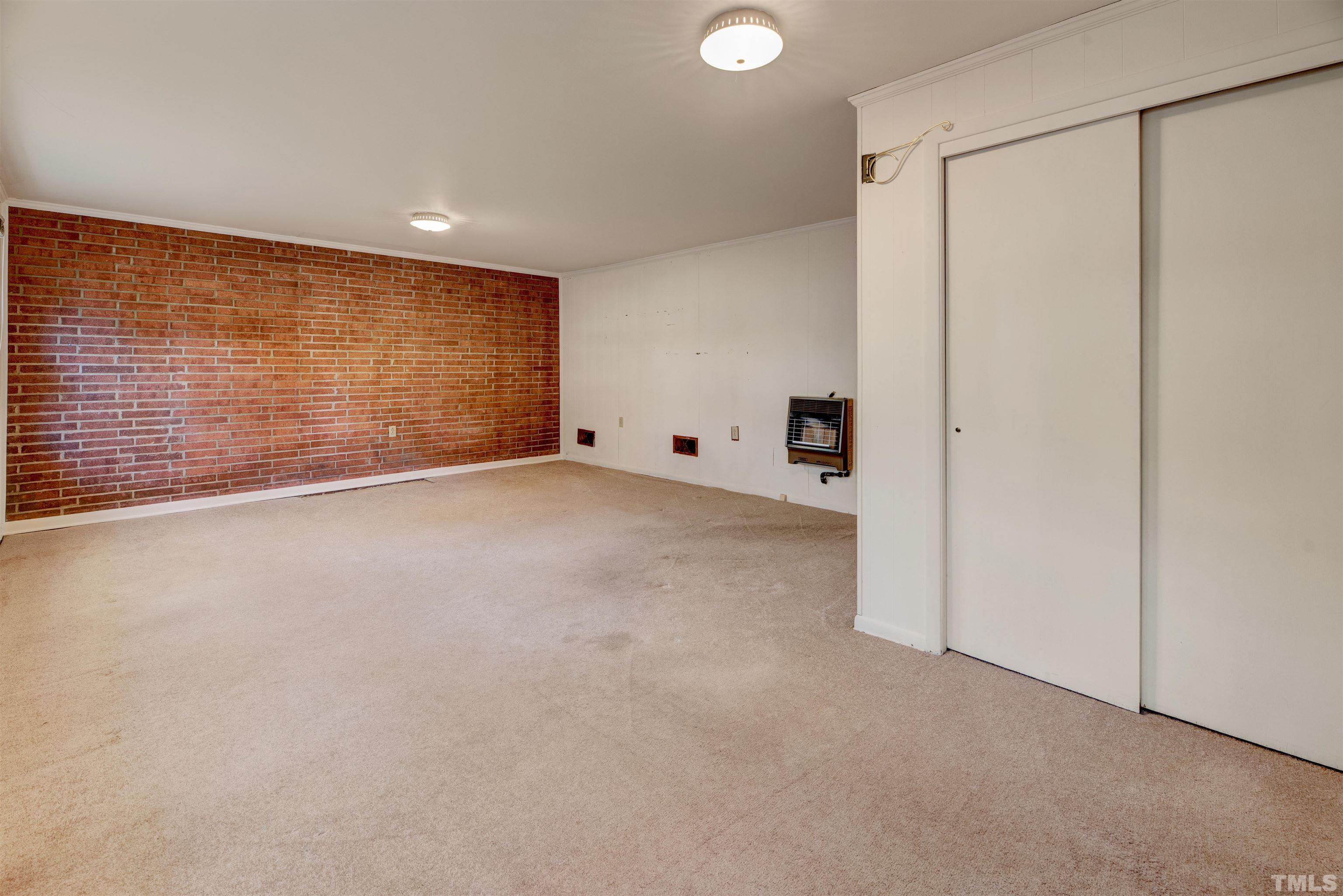 1807 Euclid Road Durham, NC 27713 - Photo 15 of 19 a view of an empty room with a window