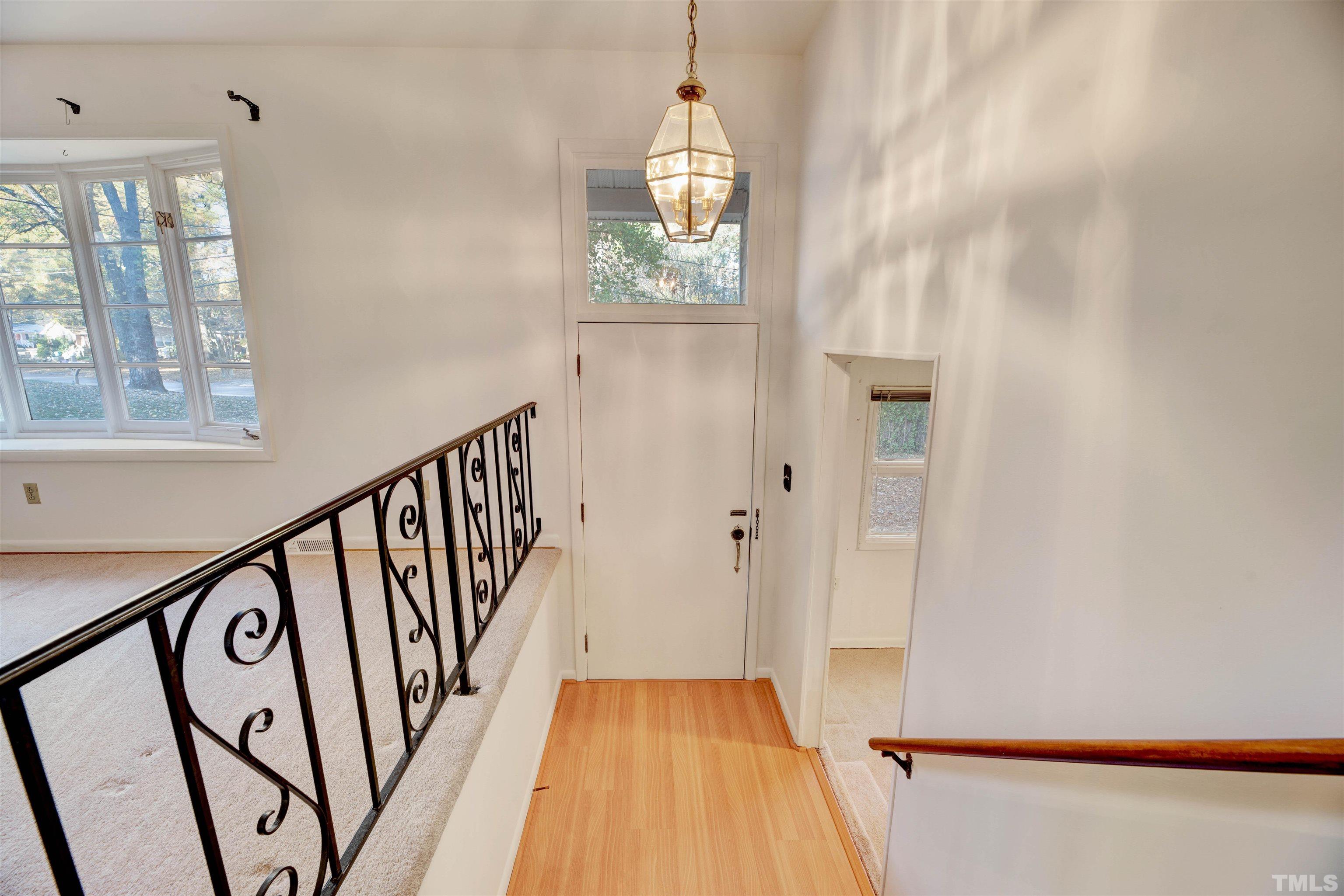 1807 Euclid Road Durham, NC 27713 - Photo 7 of 19 a view of entryway with wooden floor