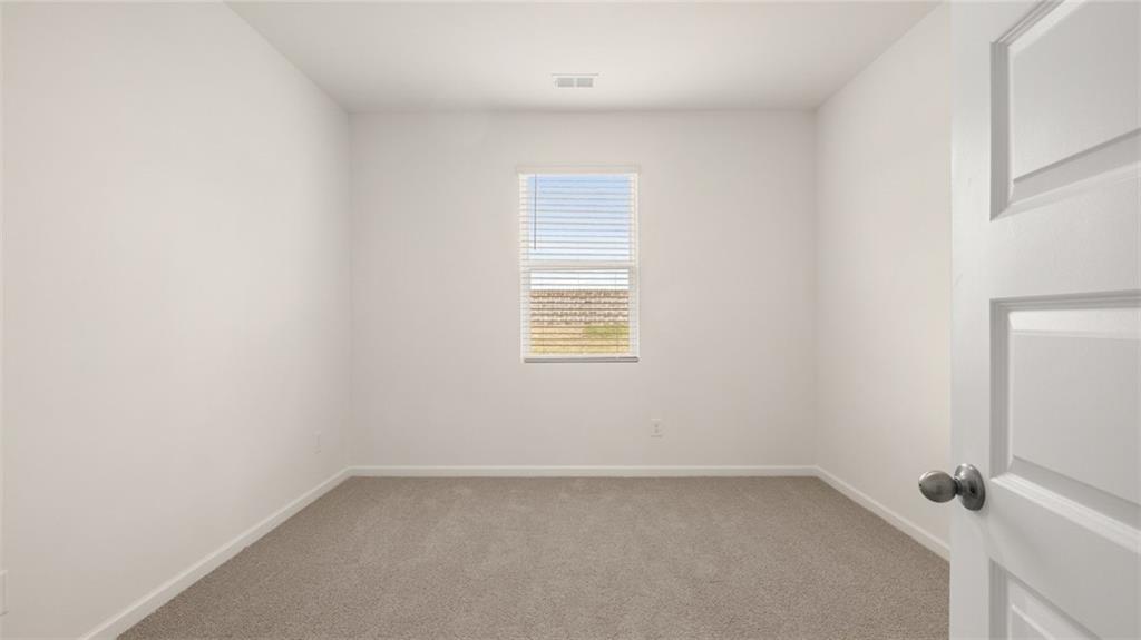 635 Whitman Lane Stockbridge, GA 30281 - Photo 31 of 42 a view of a small space with a window