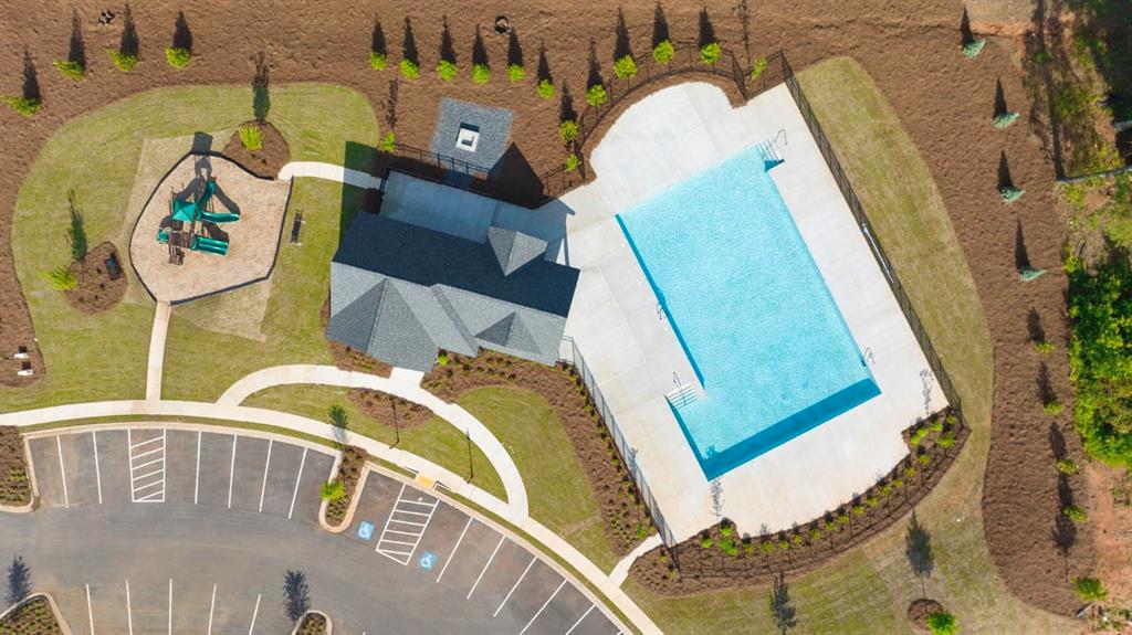 635 Whitman Lane Stockbridge, GA 30281 - Photo 6 of 42 a view of a swimming pool with a chairs