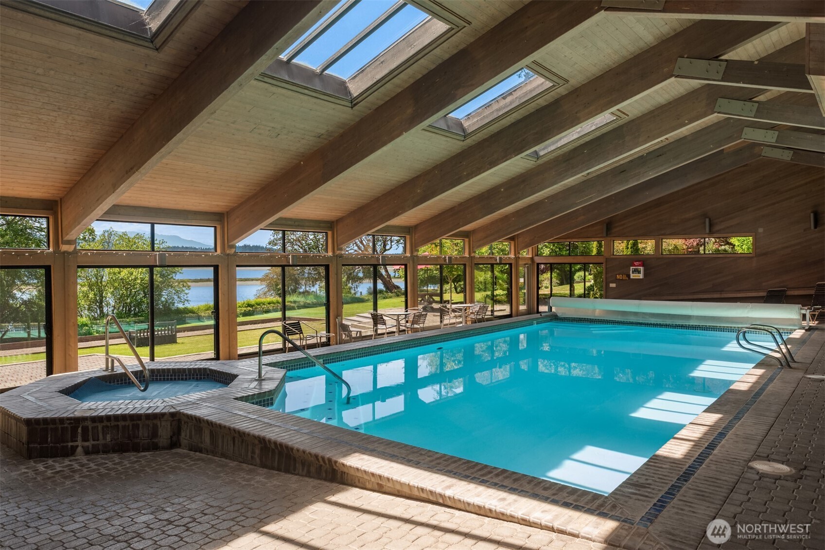 4065 East Sequim Bay Road, Unit 12 Sequim, WA 98382 - Photo 38 of 40 a view of swimming pool with outdoor seating