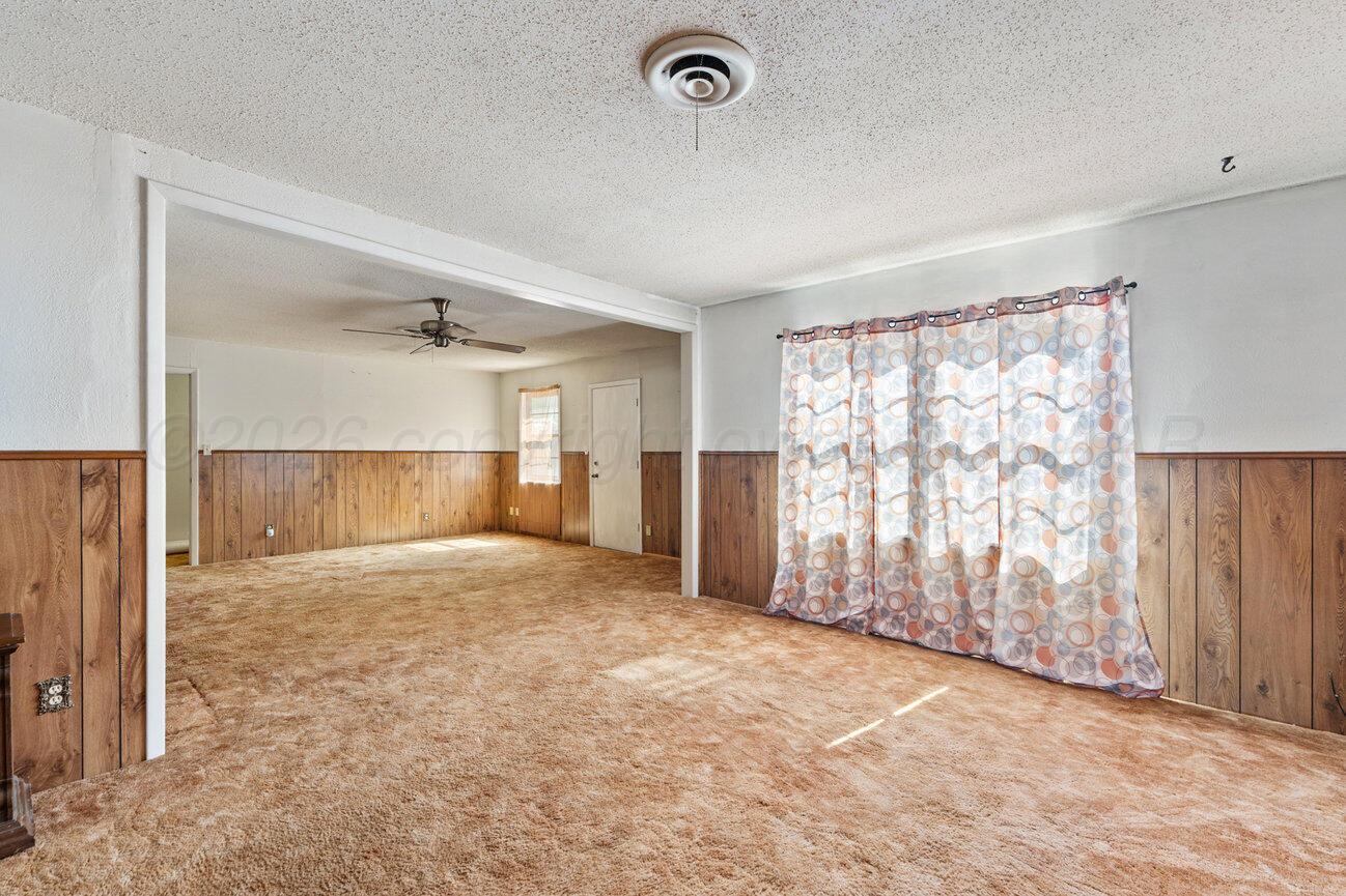 4305 South Bonham Street Amarillo, TX 79110 - Photo 5 of 48 an empty room with a empty space and windows