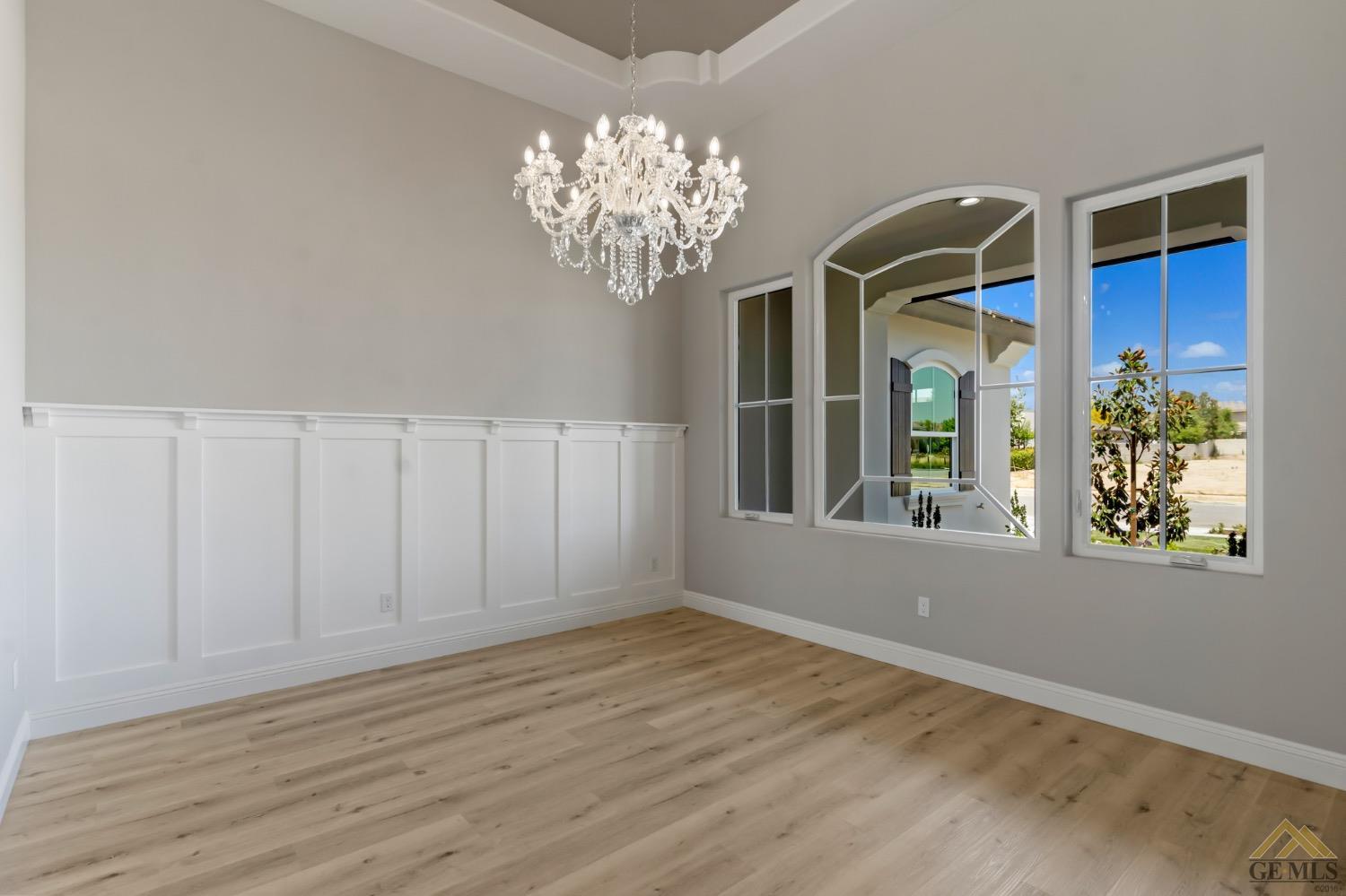 Undisclosed Address Bakersfield, CA 93311 - Photo 16 of 75 a view of an entryway with wooden floor
