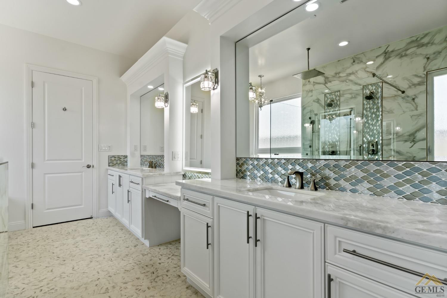 Undisclosed Address Bakersfield, CA 93311 - Photo 39 of 75 a bathroom with a double vanity sink mirror and double