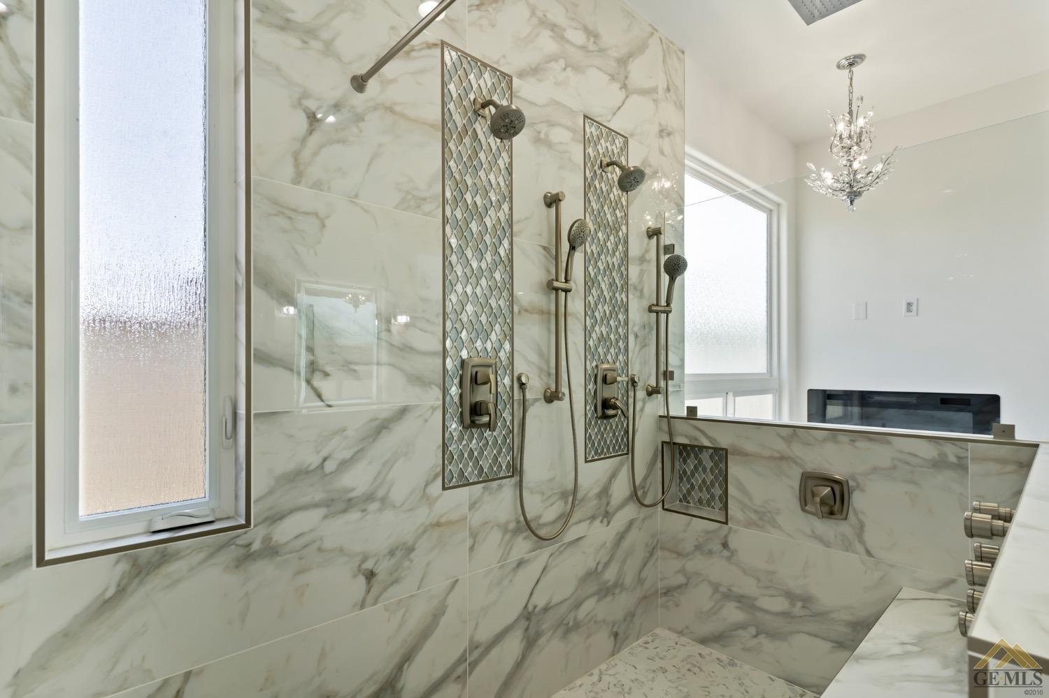 Undisclosed Address Bakersfield, CA 93311 - Photo 41 of 75 a bathroom with a shower and a sink