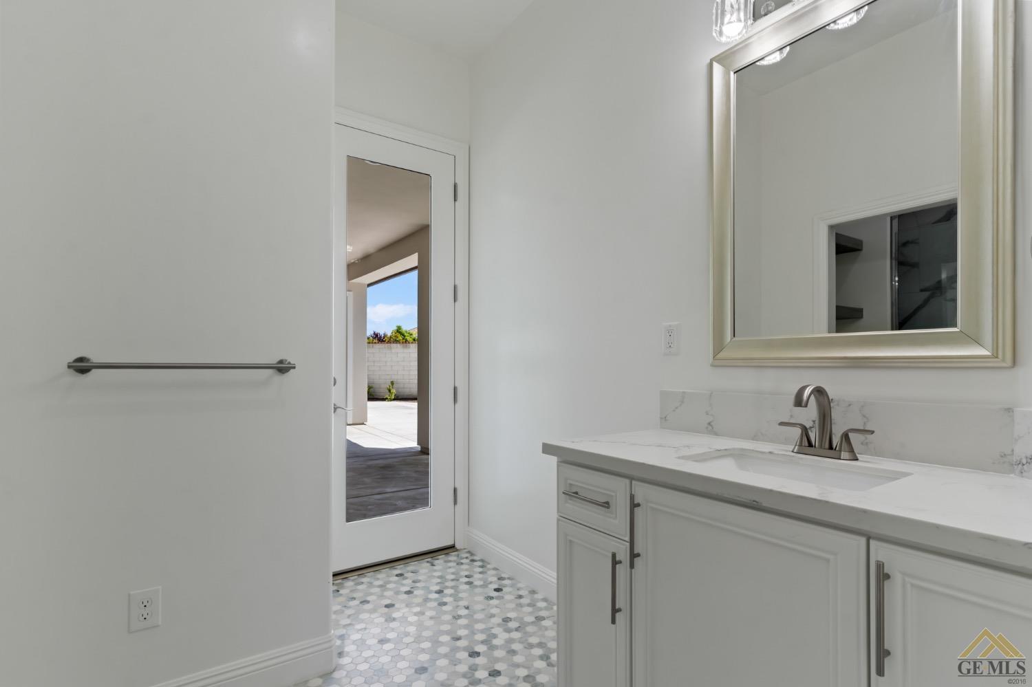 Undisclosed Address Bakersfield, CA 93311 - Photo 58 of 75 a bathroom with a sink a toilet and shower