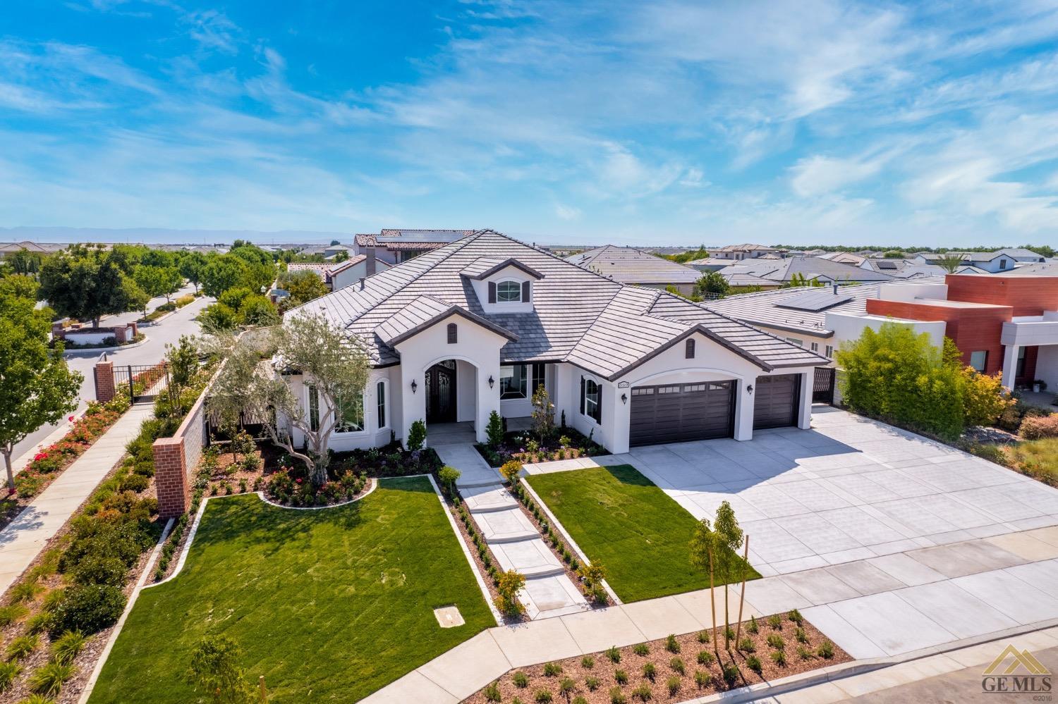 Undisclosed Address Bakersfield, CA 93311 - Photo 7 of 75 an aerial view of a house with a big yard