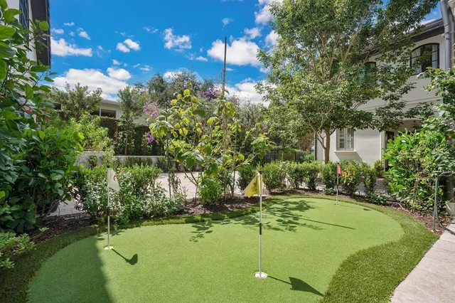a view of a golf course with a park
