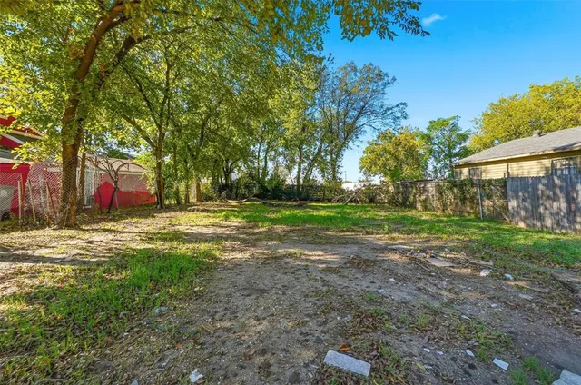 a view of swimming pool with tree s