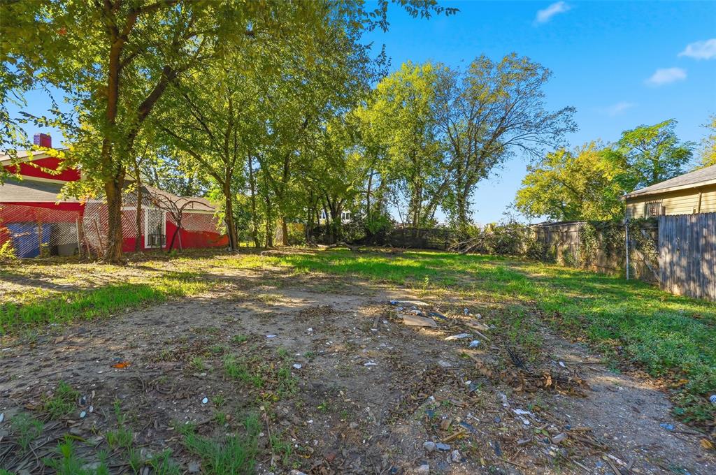 2715 Springdale Street Dallas, TX 75210 - Photo 8 of 9 a view of swimming pool with tree s