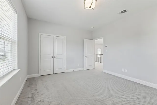 an empty room with an entryway