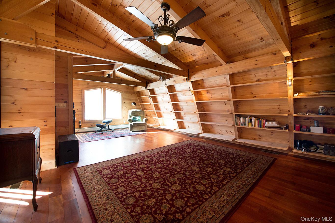 1644 Lakes Road Monroe, NY 10950 - Photo 18 of 49 a large room with wooden floor
