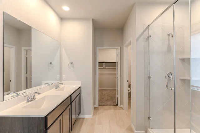 a bathroom with a bathtub and a sink
